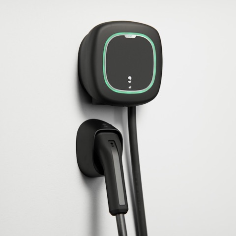 Wallbox Pulsar Pro mounted on a wall with its plug holster